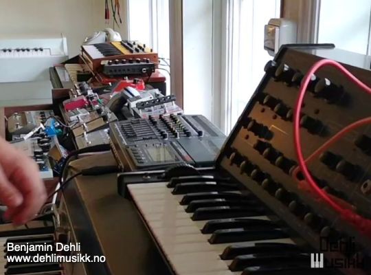 A Fender Rhodes MKI electric piano with a Korg MS-20 synthesizer on top