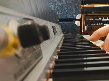 A Fender Rhodes MKI electric piano being played