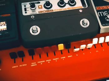 Red Yamaha YC-25D combo organ with effects pedals on top