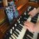A Hammond C3 organ with effects pedals on top
