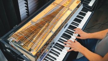 A Fender Rhodes electric piano being played