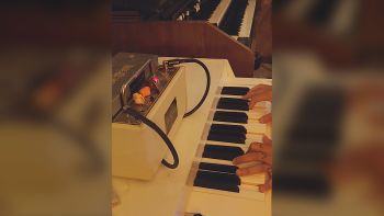 A Mellotron M4000D with a Fulltone Tube Tape Echo on top being played