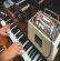 A Korg CX-3 organ with effects units on top being played