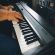 A Yamaha DX7 synthesizer being played