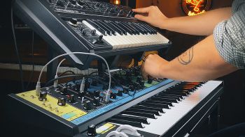 A Roland SH-09 synthesizer and a Moog Matriarch synthesizer being played