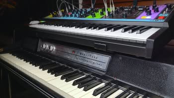 A Wurlitzer 200A electric piano with a Moog Matriarch analog paraphonic synthesizer on top