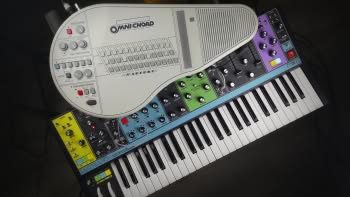 A Suzuki Omnichord System Two OM-84 and a Moog Matriarch synthesizer
