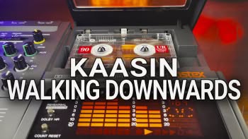 A 4-track cassette recorder and the text Kaasin - Walking Downwards