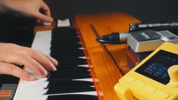 A Hohner Clavinet D6 with a 1010music nanobox | lemondrop granular synthesizer on top being played