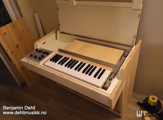 A Mellotron M4000D with a partly built custom cabinet