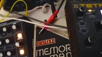 Moog Minitaur synthesizer, Electro-Harmonix Deluxe Memory Man delay pedal and a DSI Tetra synthesizer