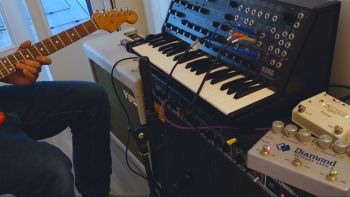 An electric guitar, a synthesizer and a guitar pedal