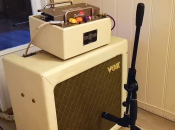 A Vox AC15H1TV amplifier with a Fulltone Tube Tape Echo effects unit on top