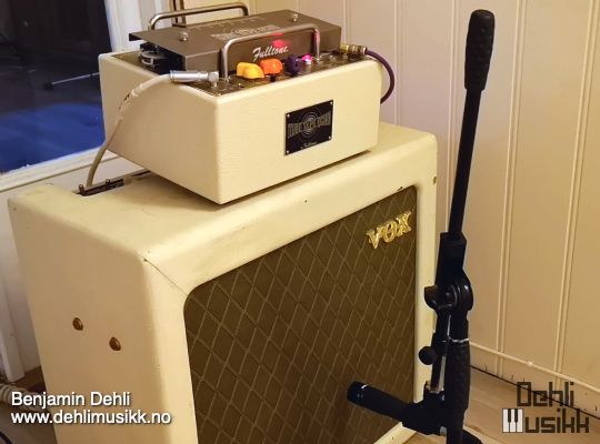 A Vox AC15H1TV amplifier with a Fulltone Tube Tape Echo effects unit on top