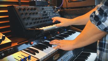 A Korg MS-20 synthesizer and a Logan String Melody II synthesizer being played