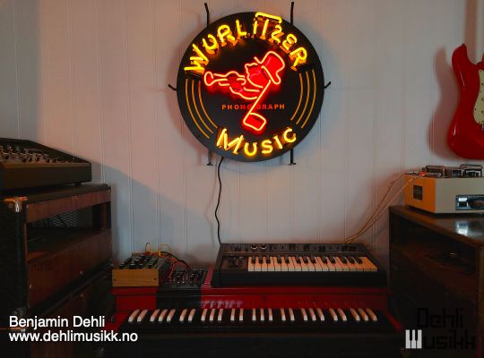 Neon sign with the text Wurlitzer Music Phonograph