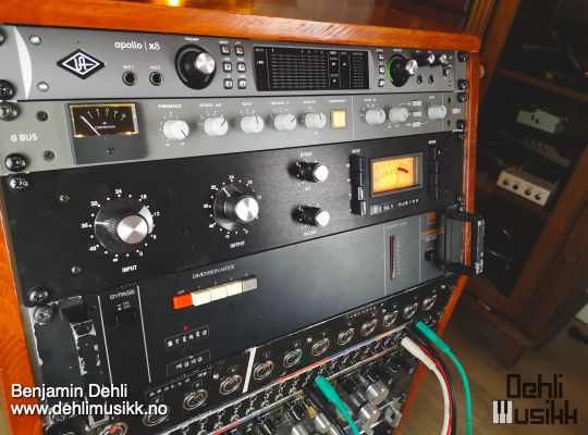 A studio rack with effects units and outboard gear