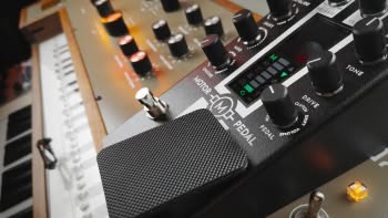 A Therevox ET-4.3 with a Gamechanger Audio MOTOR pedal on top