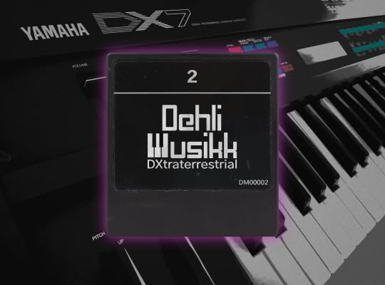 DXtraterrestrial 2 cartrigde with a Yamaha DX7 synthesizer in the background