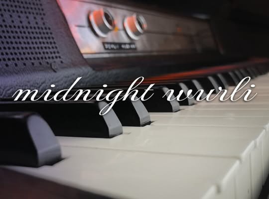 Logo with the text Midnight Wurli and a Wurlitzer 200A electric piano in the background